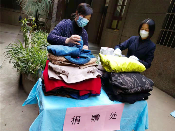 1616576931861619.jpg 捐衣1_副本.jpg